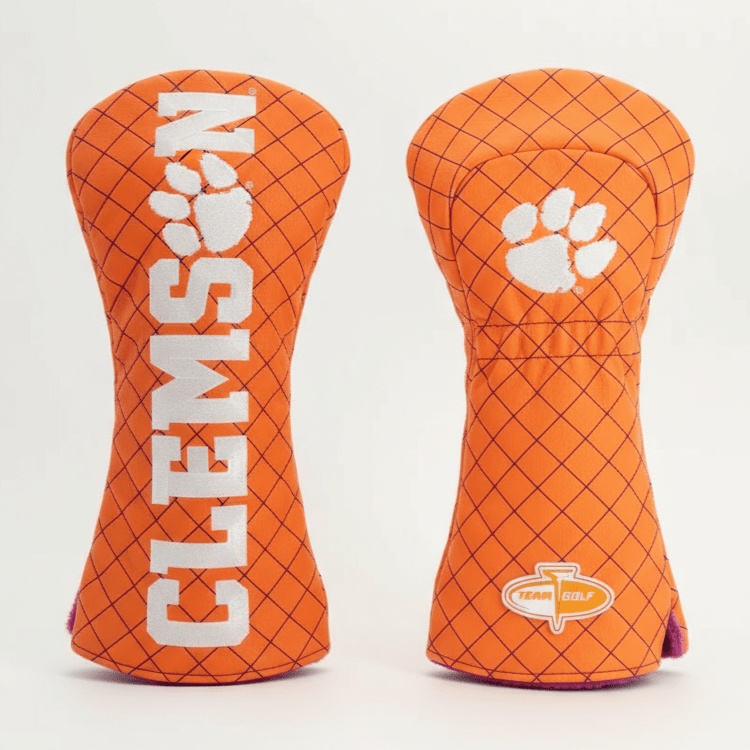 Two orange golf club head covers with 'Clemson' branding on a light gray background