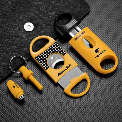 Cohiba cigar accessories set on a textured black surface
