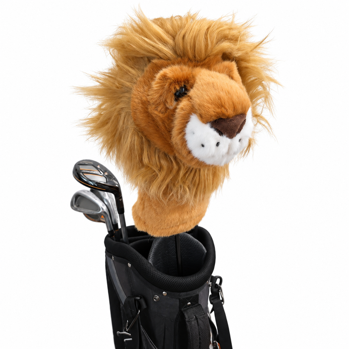 A plush lion head golf club headcover with a fluffy golden-brown mane and white muzzle, shown inserted into the top of a black golf bag on a white background.