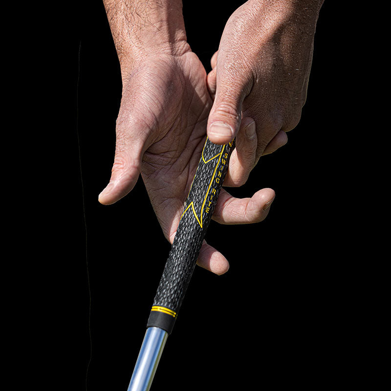 Hands holding the black and yellow V55 Cord grip