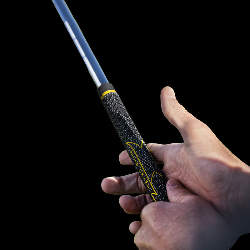 Hand beside the textured black and yellow V55 Cord grip