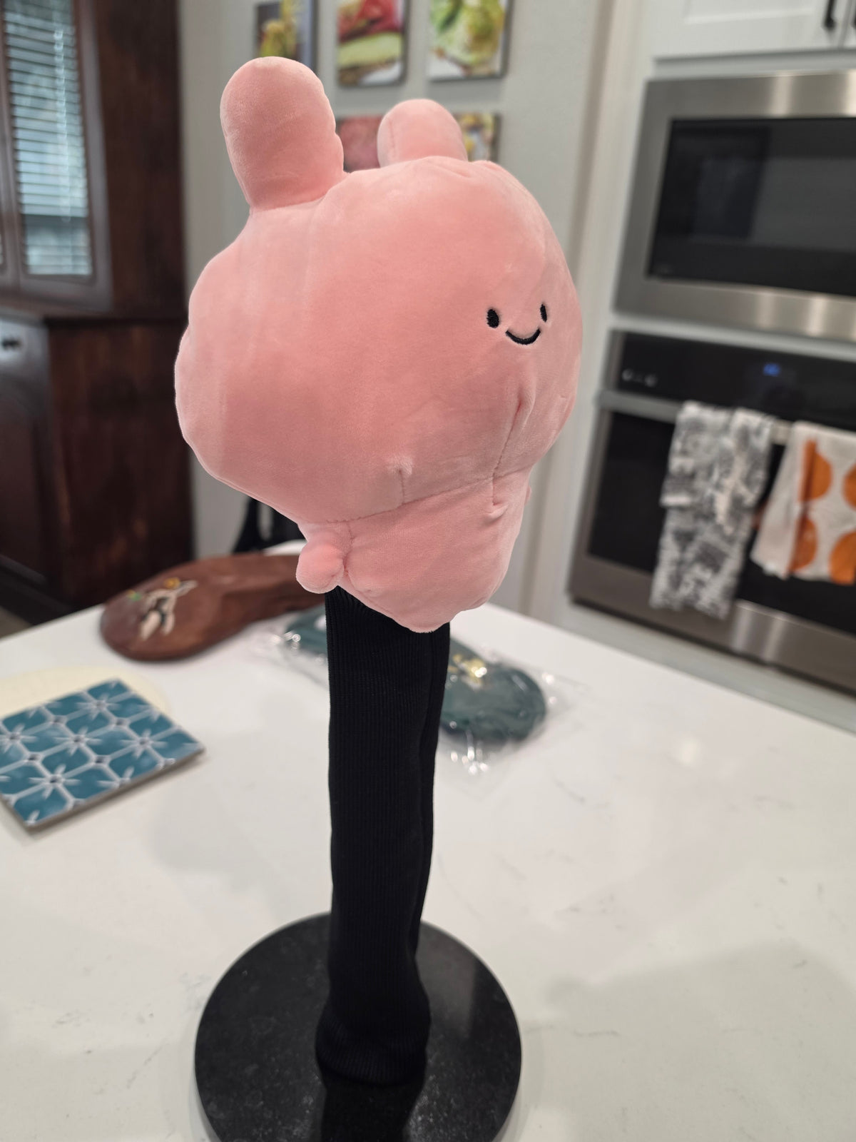 CRG Peachy Keen pink bunny driver headcover three-quarter view with long black protective sock