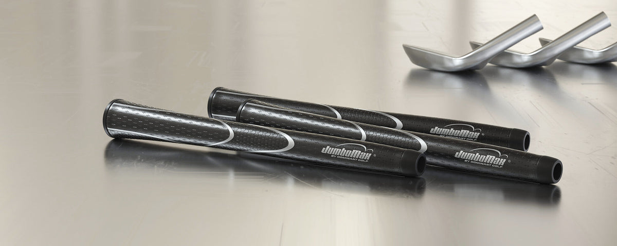Black and silver Tour Series grips on a work surface