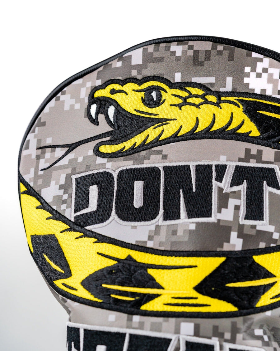 Yellow embroidered snake above bold Don't lettering on gray digital camouflage