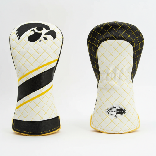 Two golf club head covers with black, yellow, and white design on a light gray background