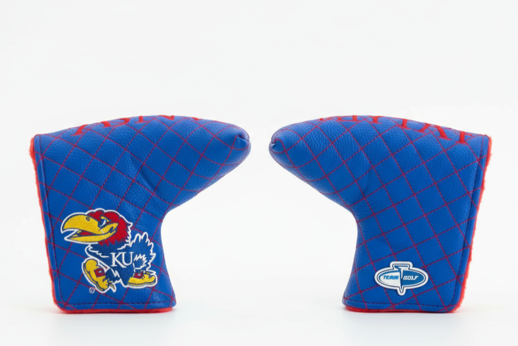 Two blue golf club covers with red stitching on a white background