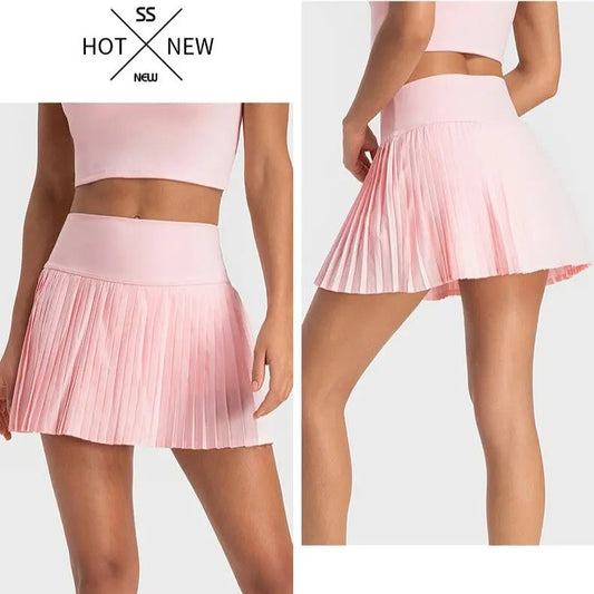 A pink golf skirt with pleated design and a stretch waistband, paired with a hot pink sports top.