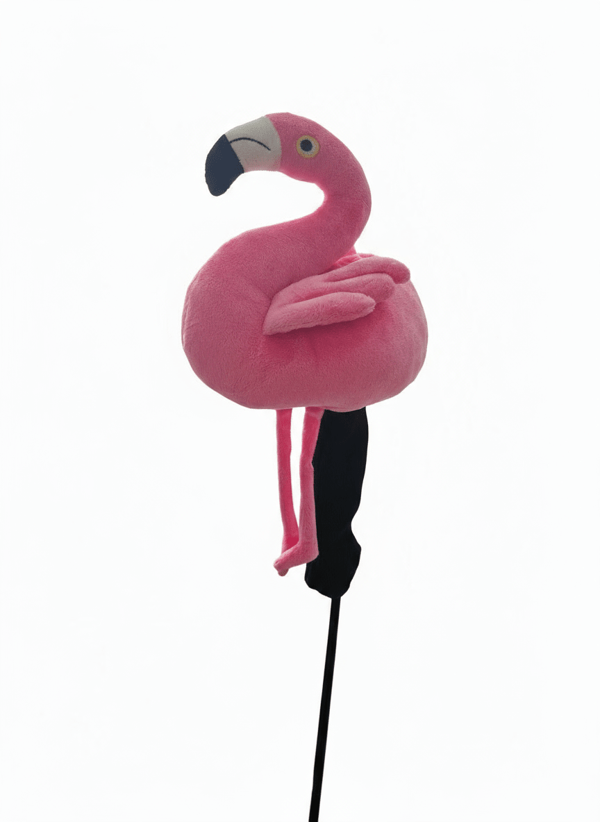 Pink flamingo toy on a stick against a white background
