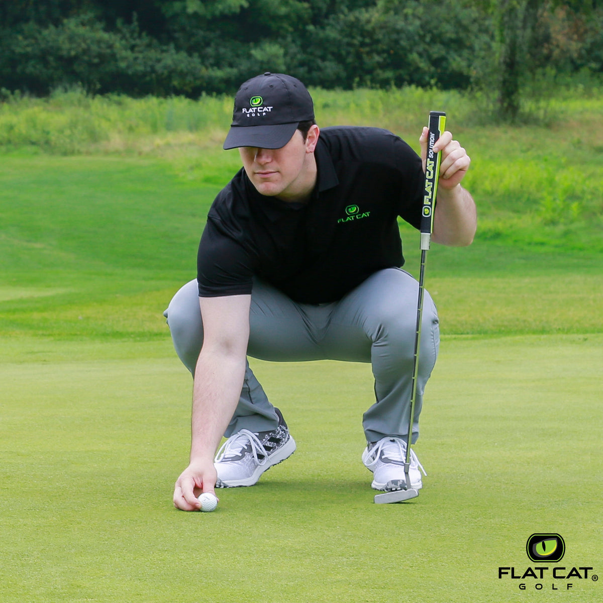 FLAT CAT Solution Pistol Putter Grip — Grip in use on the putting green