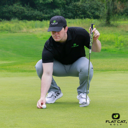 FLAT CAT Solution Pistol Putter Grip — Grip in use on the putting green