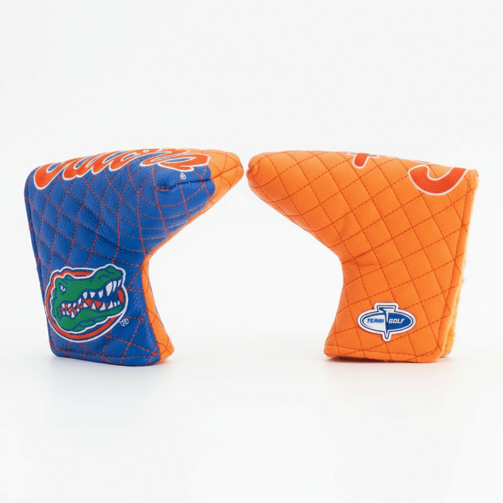 Two golf club covers, one blue with a gator logo and one orange, on a white background.