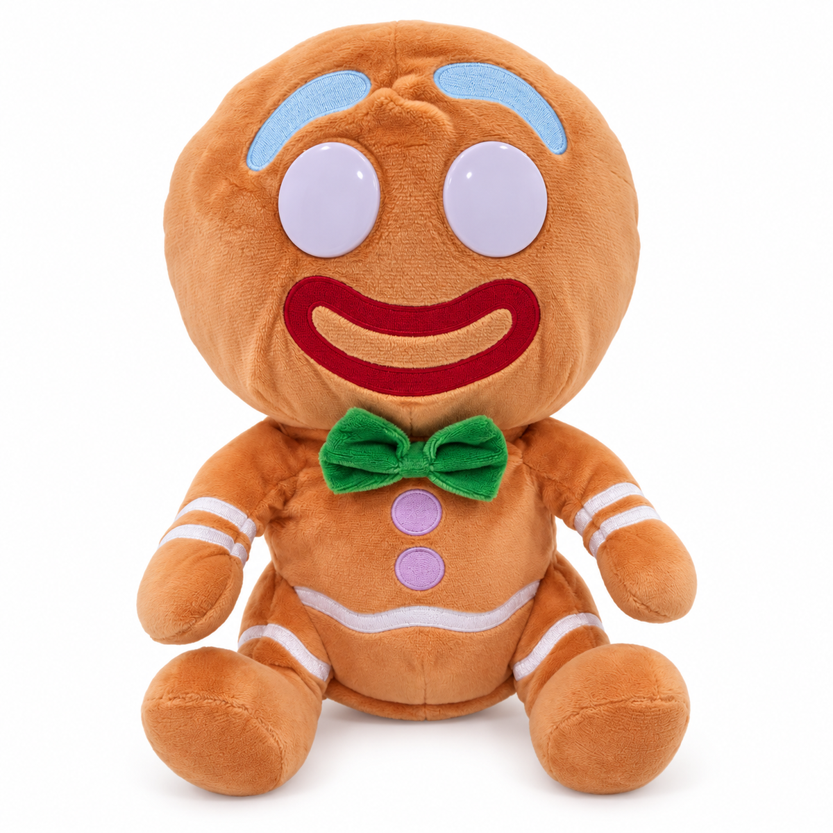 A plush gingerbread person toy with a round head, large white eyes, a red embroidered smile, light blue eyebrows, a green bow tie, and white stripe details on a plain white background.