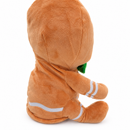A plush toy shaped like a cartoon character wearing an orange hooded outfit with white stripes and a small green accent, photographed on a clean white background.