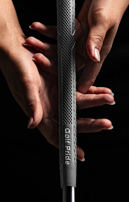 Hands around the fuller lower section of a Golf Pride CPX grip