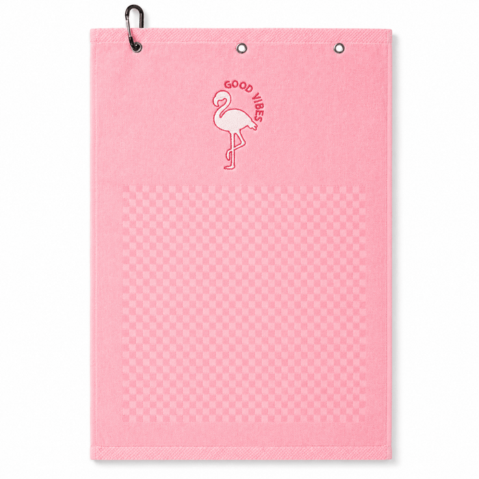 Pink towel with flamingo design and 'Good Vibes' text on a white background