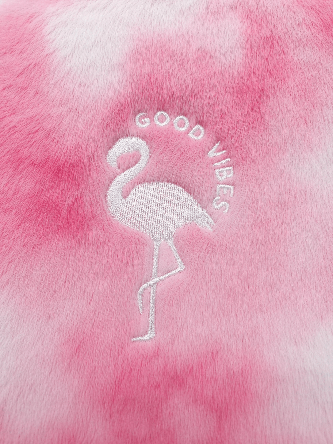 Flamingo with 'Good Vibes' text on pink and white tie-dye fabric