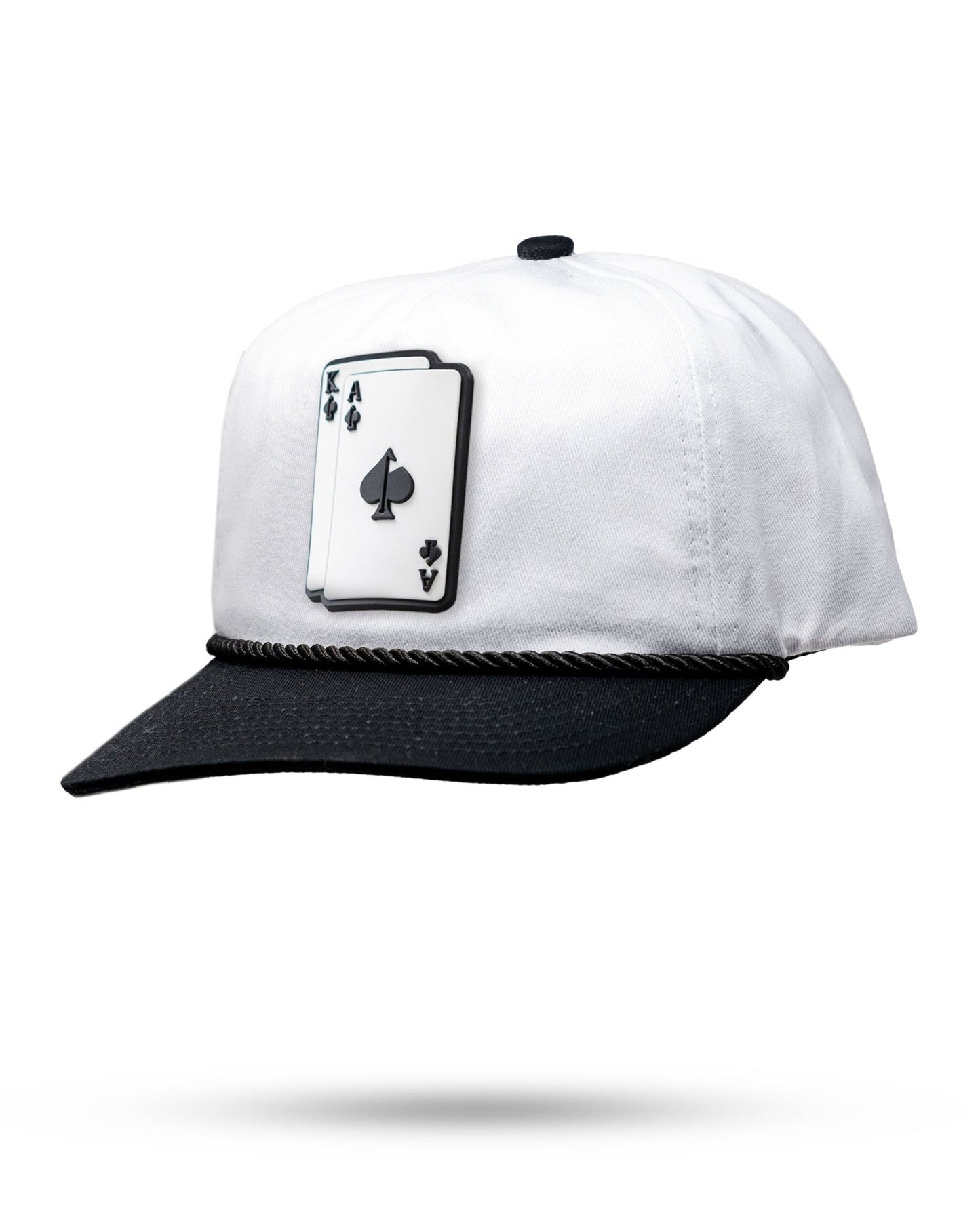 White and black cap with a card suit symbol on a white background