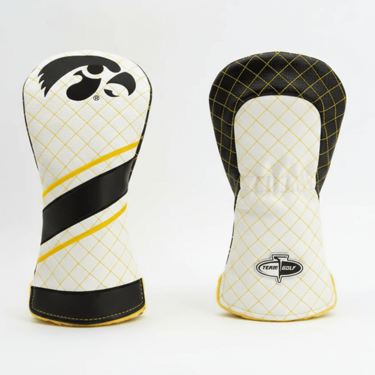 Two golf club head covers with black, yellow, and white design on a light gray background