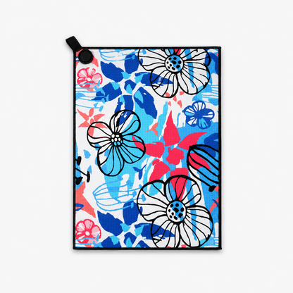 Colorful floral towel with a black border on a white background