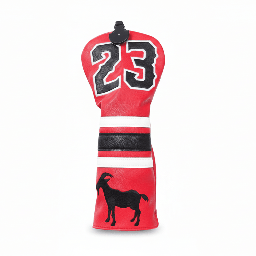 Red golf club head cover with black number 23 and goat silhouette on a white background