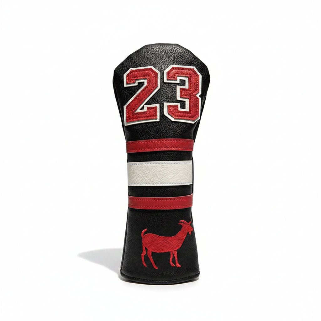 Golf club head cover with number 23 and goat design on grass