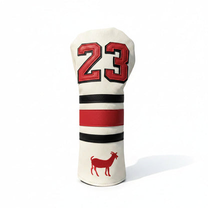 Golf club head cover with number 23 and deer design on grass