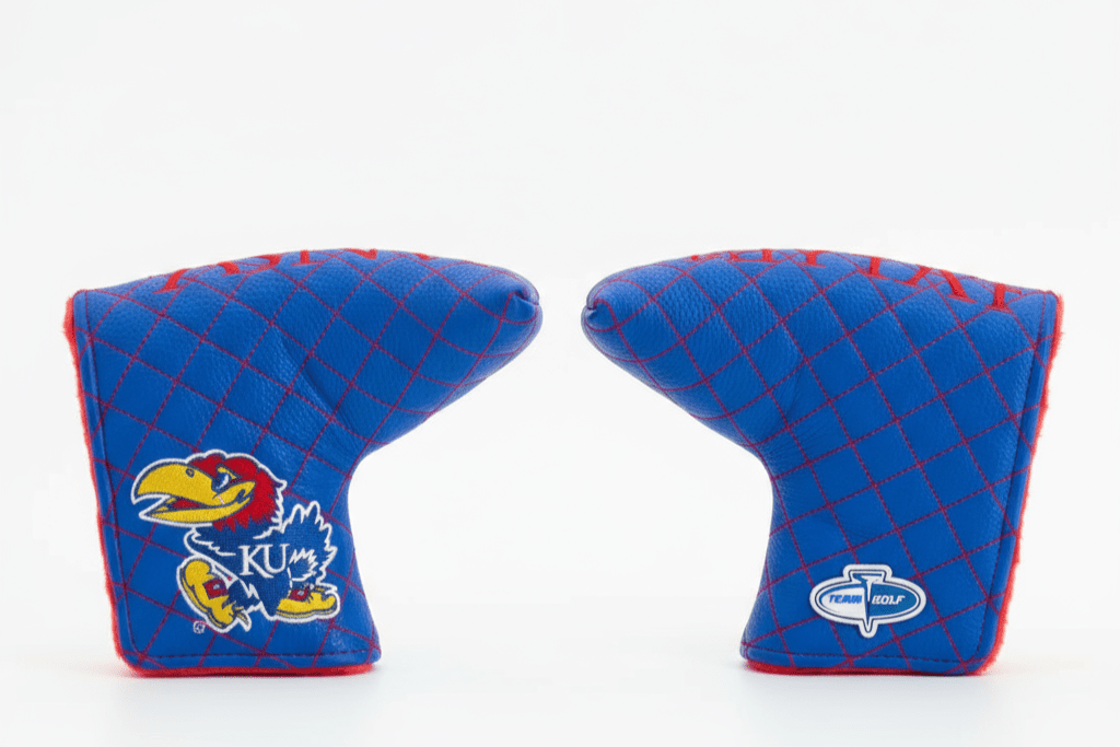 Two blue golf club covers with red stitching on a white background