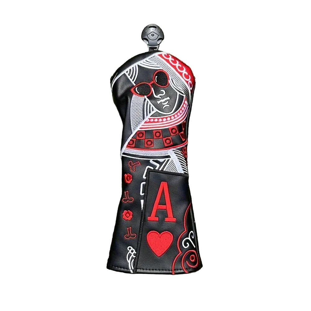 Golf club head cover with playing card design on grass