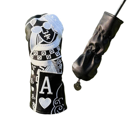 Golf club head cover with decorative patterns and letter 'A' on a grass background