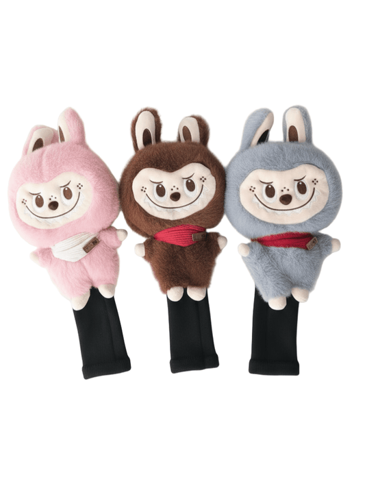 Three labubu headcovers on a white background