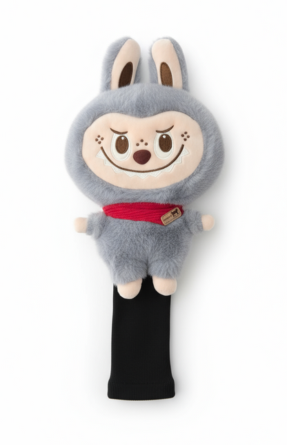Gray plush toy with a red scarf on a white background