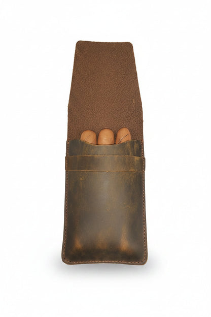 Brown leather pouch with three cylindrical objects on a white background