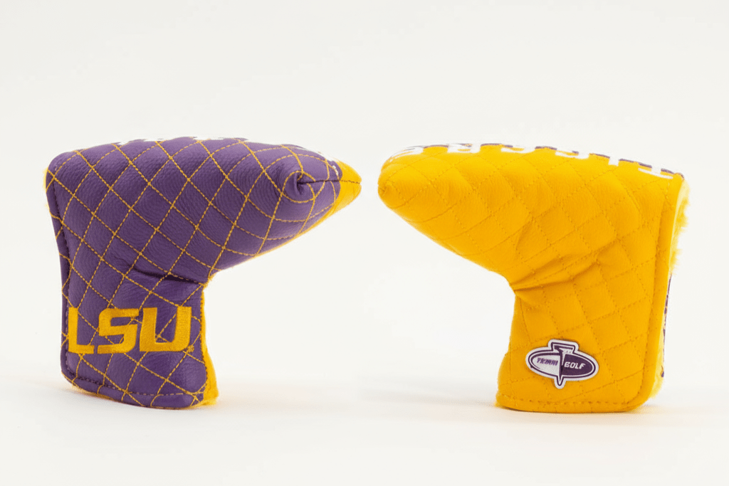 Purple and yellow golf club covers with LSU logo on a white background