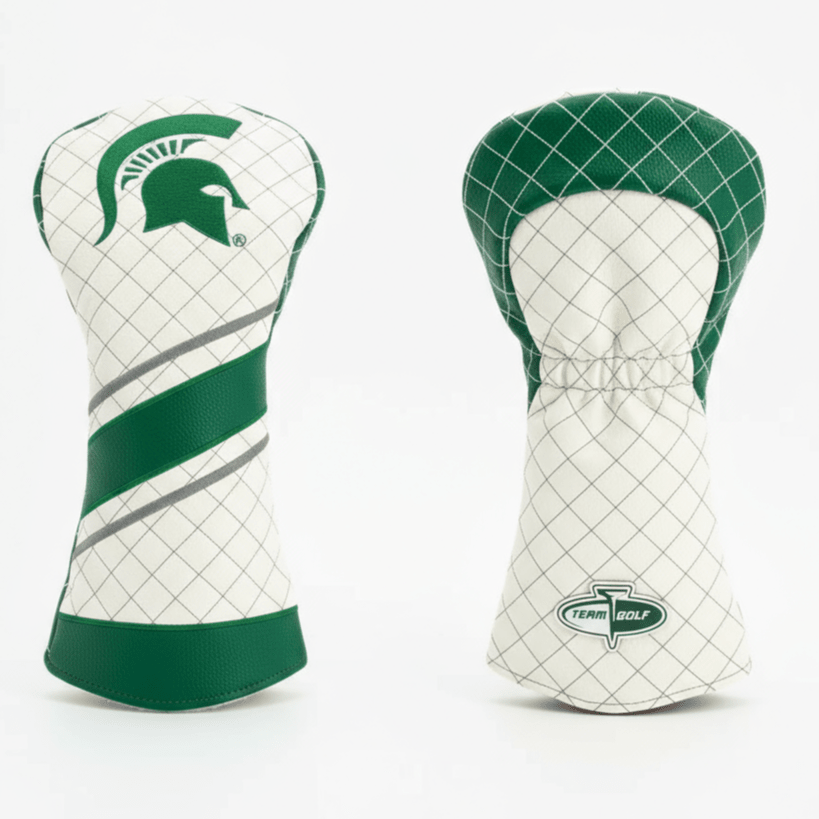 Two green and white golf club head covers on a light gray background