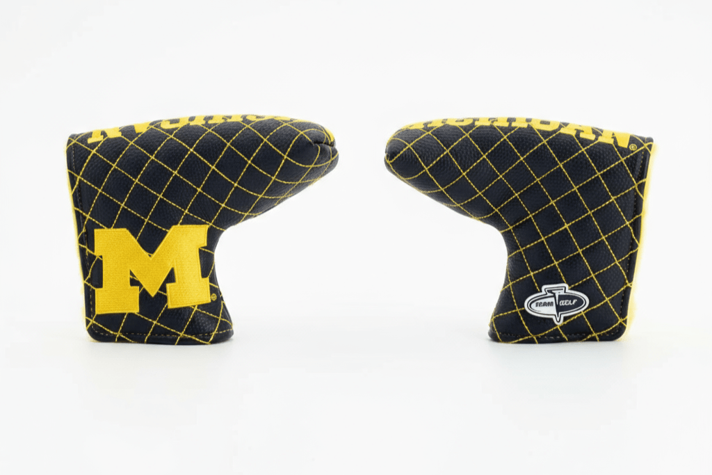 Two golf club covers with a grid pattern and 'M' logo on a white background