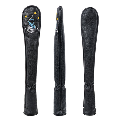 Black leather paddle with a design on a white background