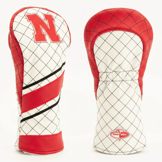 Red and white golf club head covers with a prominent 'N' logo on a light gray background