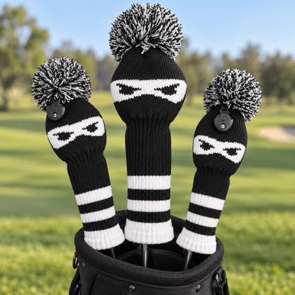 Three-piece ninja knit golf headcover set displayed on clubs in a black golf bag