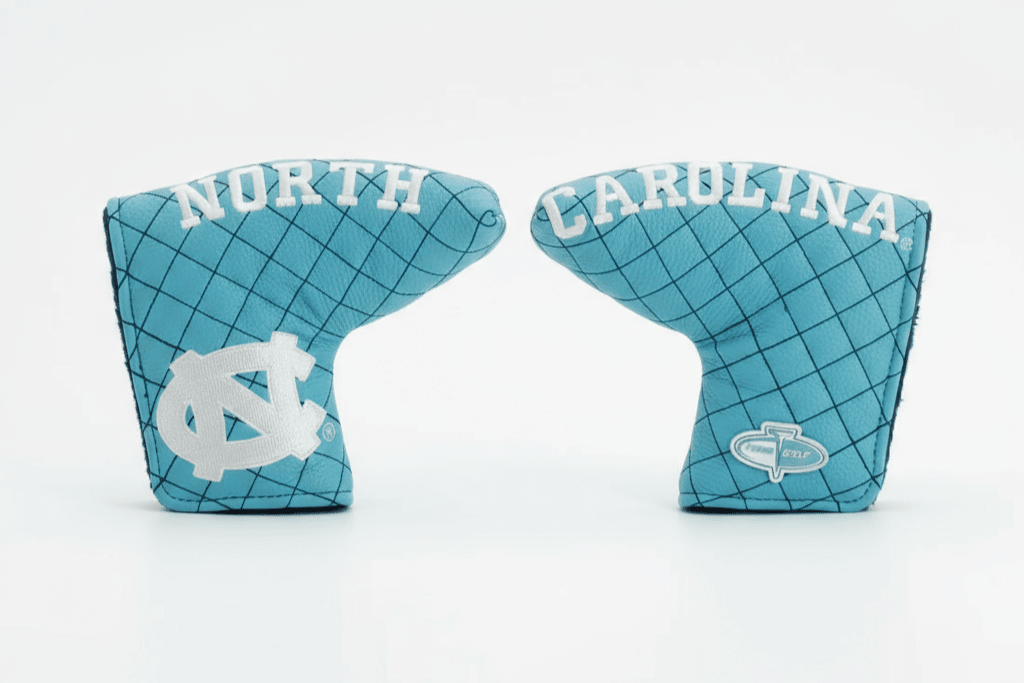 Two blue golf club head covers with 'North Carolina' text on a white background