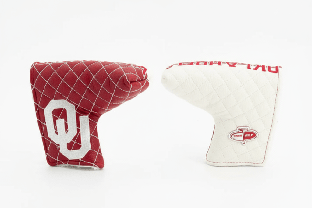 Two golf club covers, one red with a white 'O' and the other white with red text, on a white background.