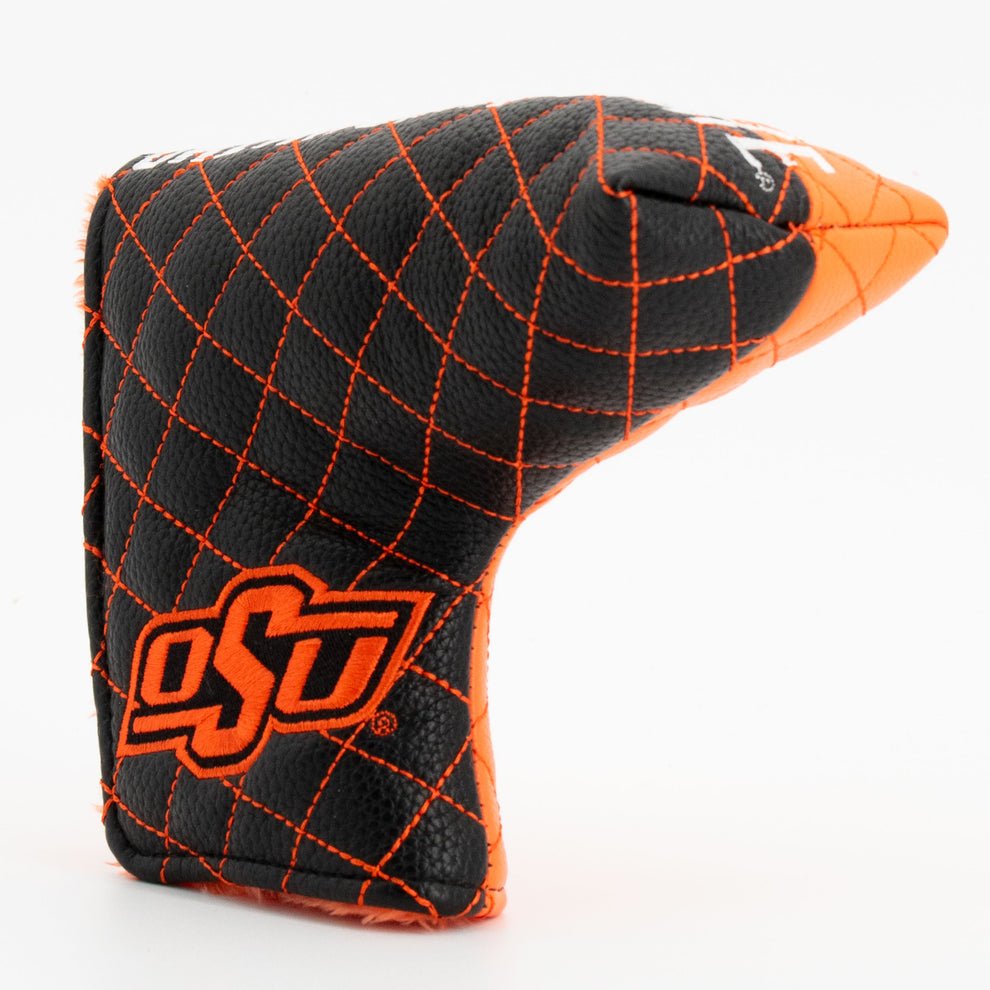 Golf club head cover with orange and black pattern and 'OSU' logo on a white background
