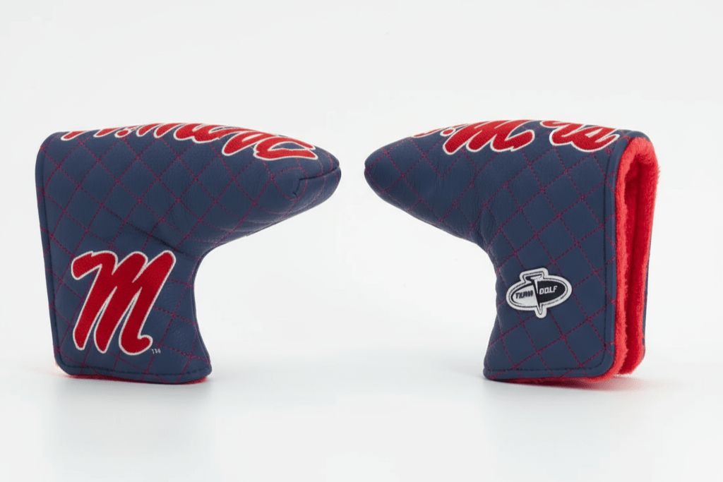 Two blue and red golf club covers with a logo on a white background