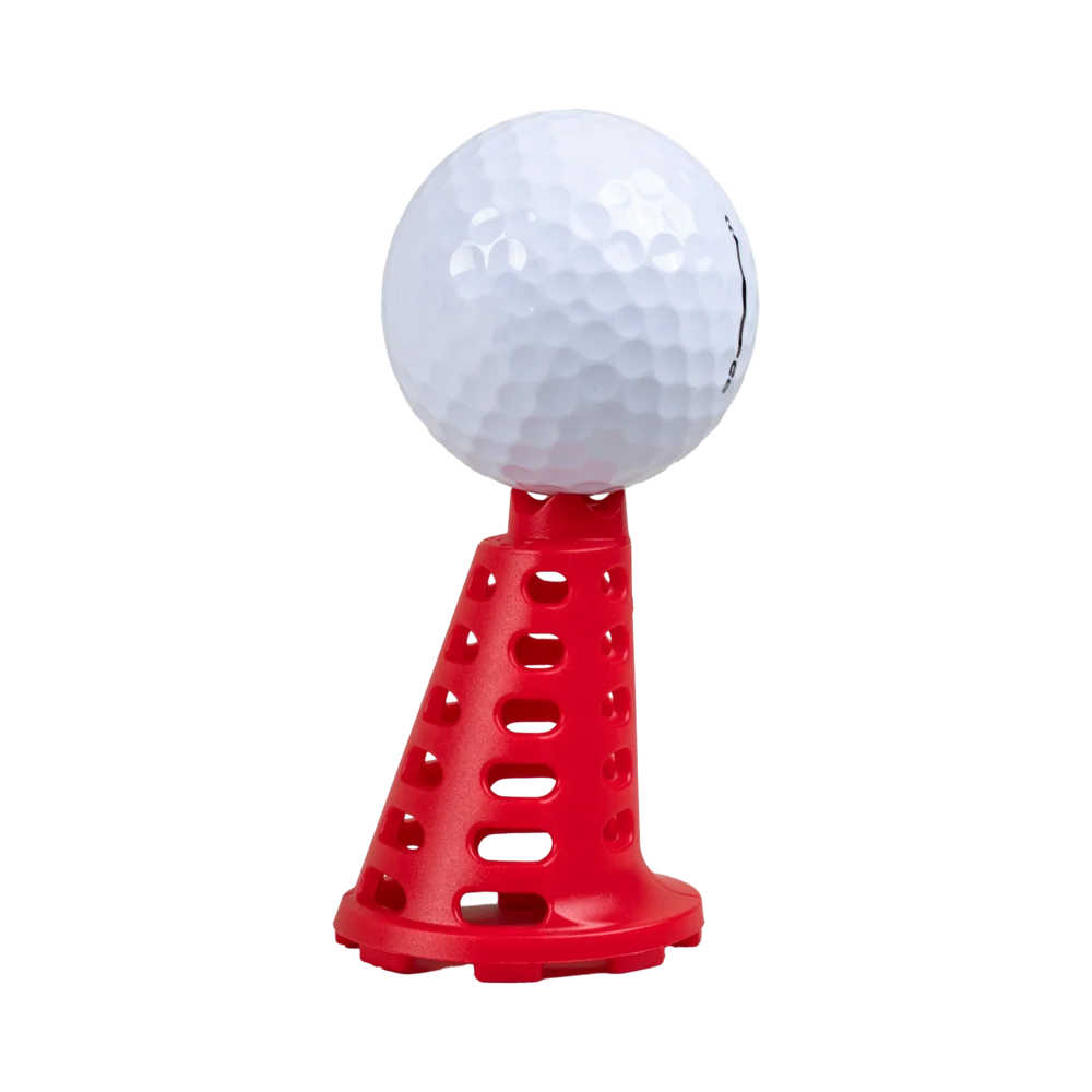 Golf ball resting on a red Pride Sports simulator tee.