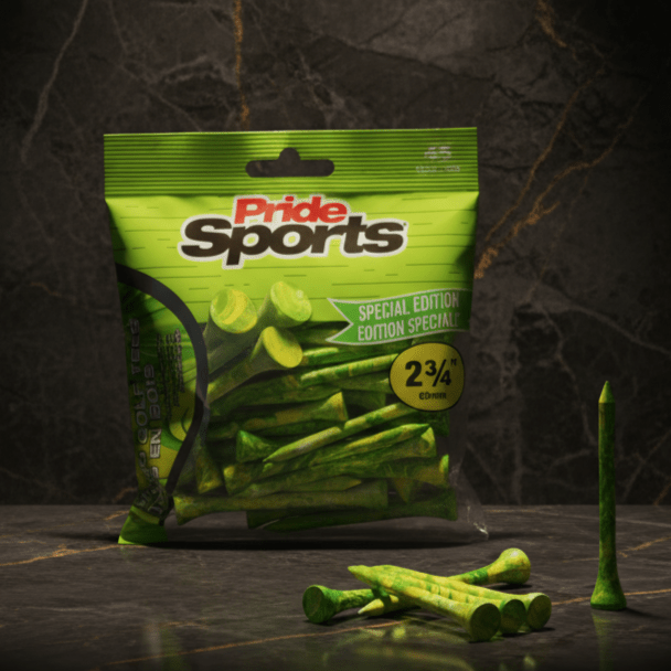 Green PrideSports golf tees packaging with green paint-splatter design and wood golf tees arranged on dark textured stone background