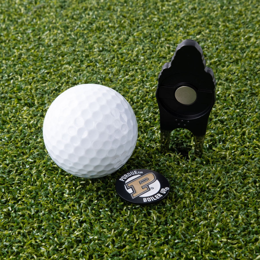 Purdue Boilermakers tool and its round marker on the green