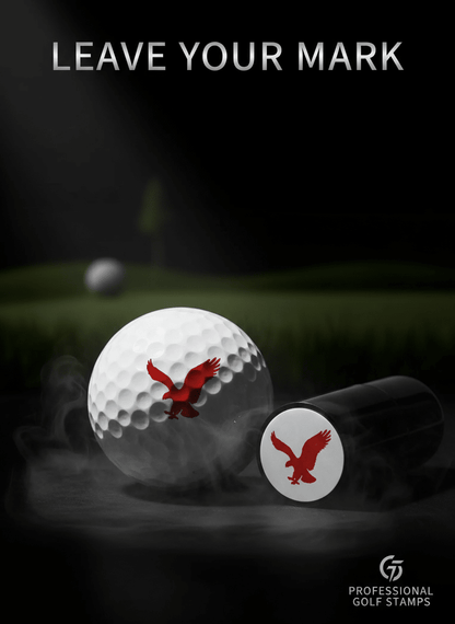 Golf ball with a red eagle logo and a stamp on a dark background with text 'Leave Your Mark'.