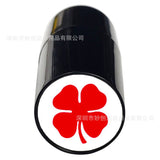 Red four leaf clover