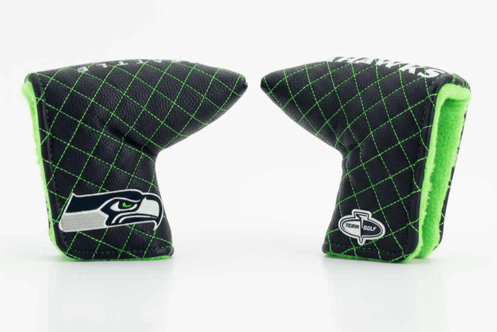 Two golf club head covers with a grid pattern and team logo on a white background