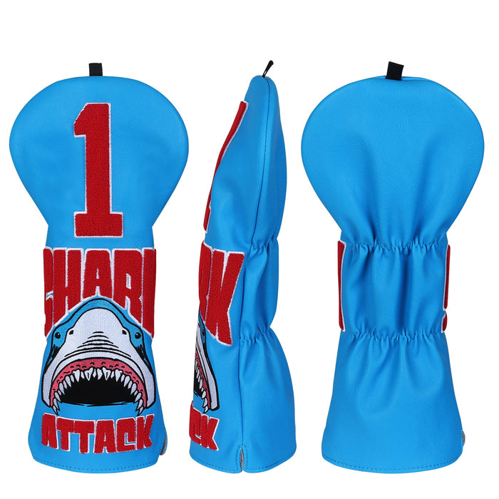 Blue golf club head cover with shark design and '1 Shark Attack' text on a white background