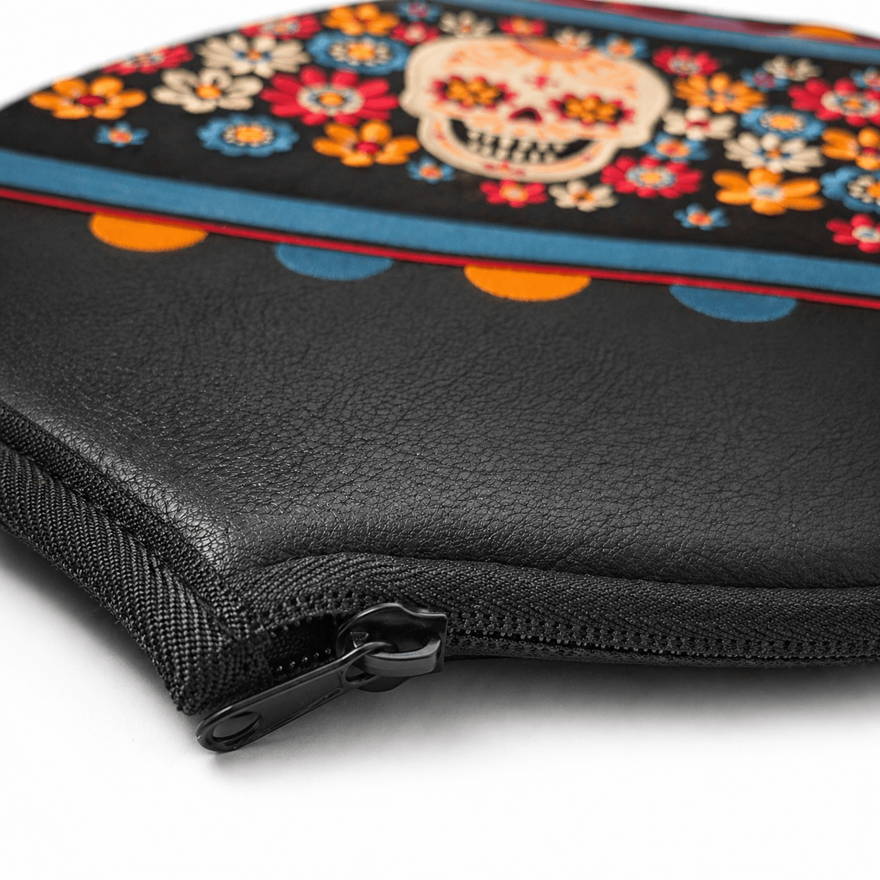 Black zippered pouch with colorful skull and floral design on a white background